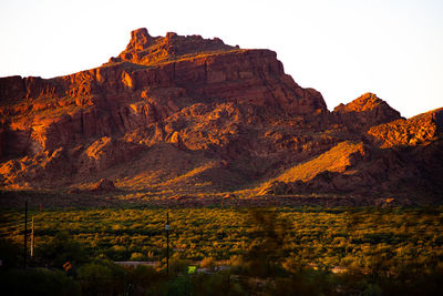 Scenic view of rocky mountains against clear sky
