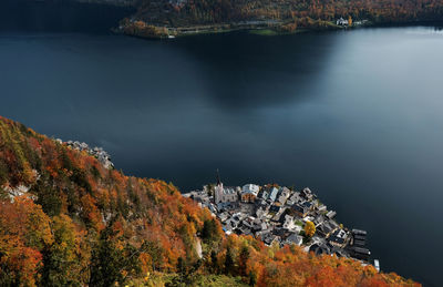 High angle view of townscape by sea