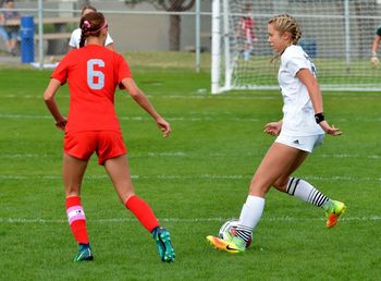 Full length of women on soccer field