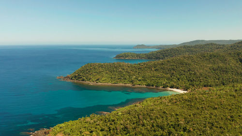 Aerial view coastline of tropical island with coral reef and blue lagoon. palawan