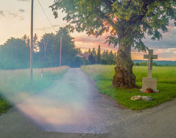 Scenic view of cemetery against sky during sunset