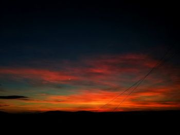 Low angle view of dramatic sky during sunset