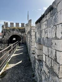 Castle wall against sky