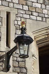 Low angle view of statue against building