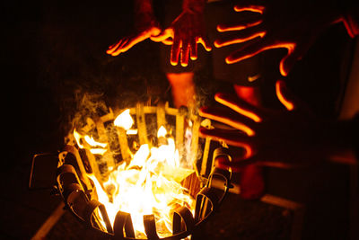 Close-up of fire burning at night