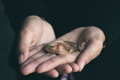 Close-up of hand holding hands