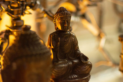 Statue of buddha against building