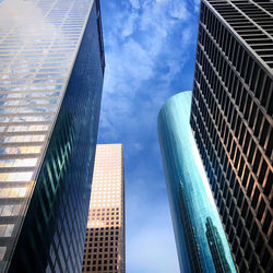 Low angle view of modern buildings against sky