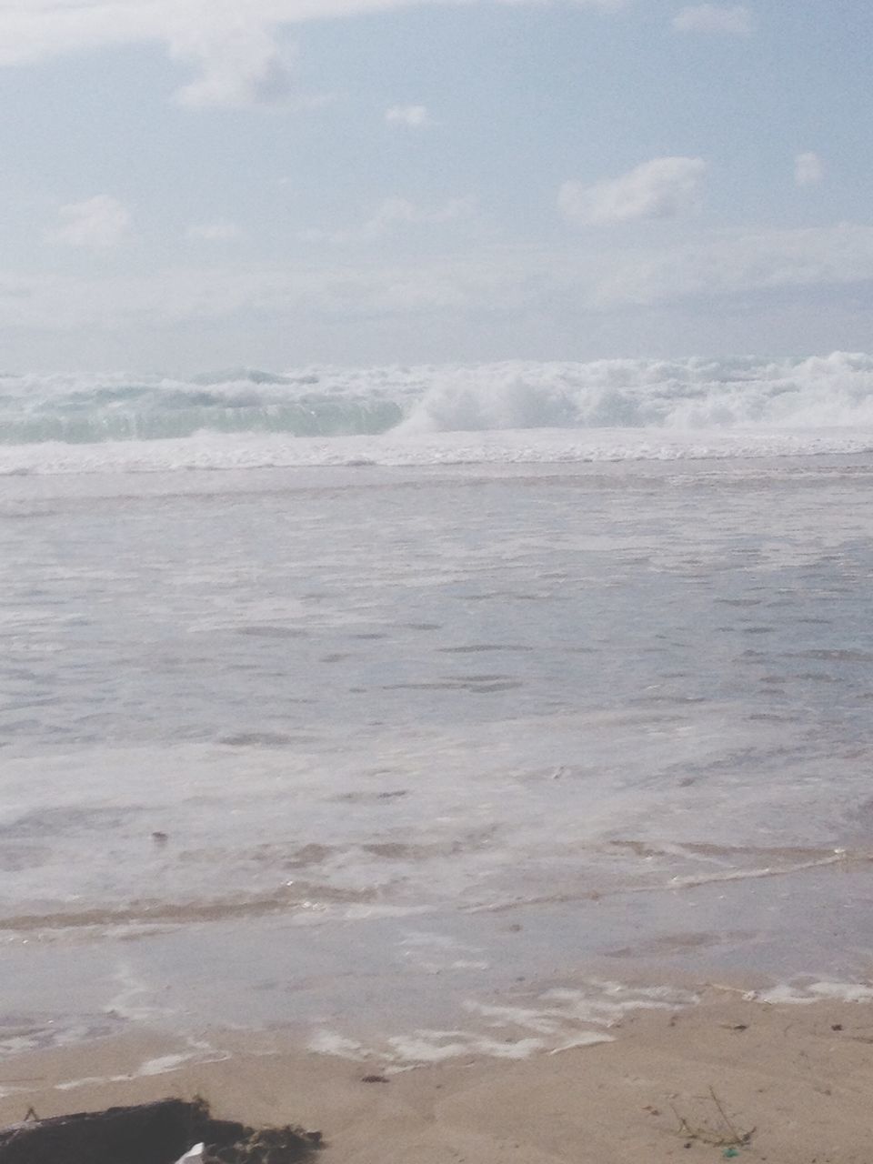 sea, water, beach, scenics, tranquil scene, sky, beauty in nature, tranquility, shore, horizon over water, nature, wave, sand, surf, idyllic, cloud - sky, remote, day, non-urban scene, coastline