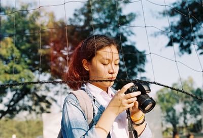 Portrait of man photographing