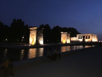 Illuminated historic building against clear sky at night