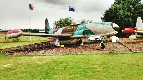 View of grassy field against sky
