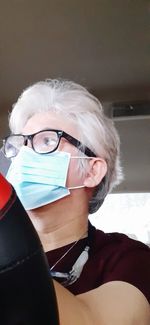 Portrait of man wearing eyeglasses