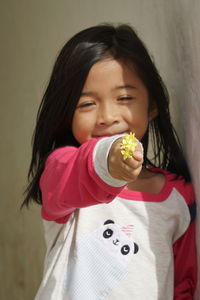 Cute girl holding ice cream