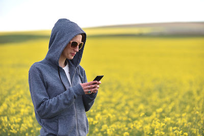 Young woman using mobile phone