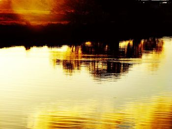 Scenic view of sea at sunset