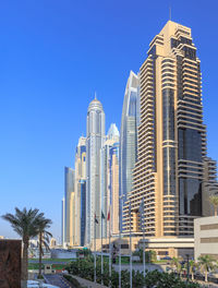 View of modern building against blue sky