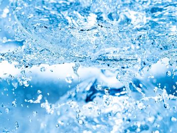 Close-up of ice cubes in water