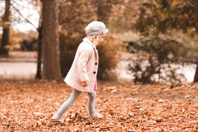 Cute girl walking in park