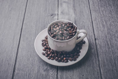 High angle view of coffee cup on table