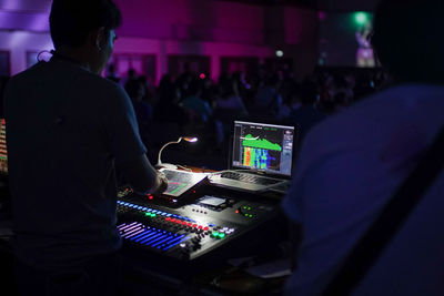 Rear view of people at music concert