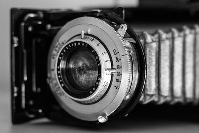 Close-up of camera on table