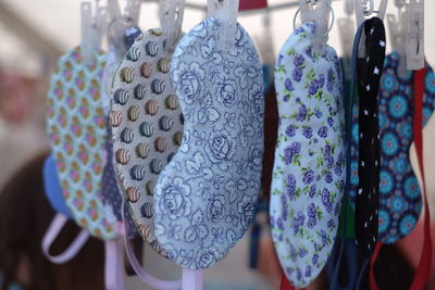 Close-up of patterned sleep masks for sale in market