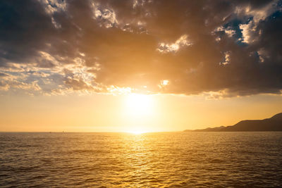 View of calm sea at sunset