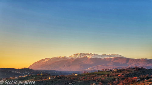 Scenic view of mountains against clear sky