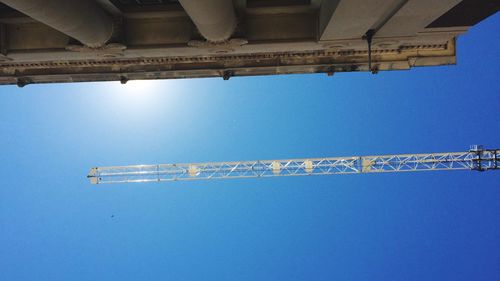 Low angle view of built structure against clear blue sky