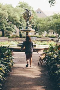 Full length of woman walking in park