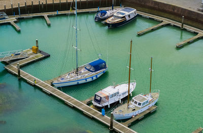 High angle view of boats moored in harbor