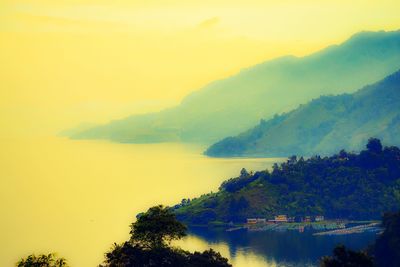 Scenic view of sunset over river