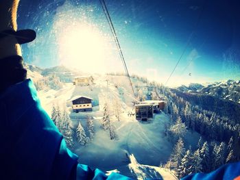 People skiing on snow covered mountain