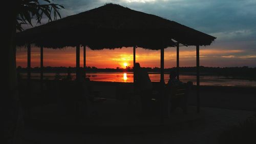 Silhouette of building during sunset