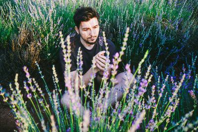 Close-up of man at field