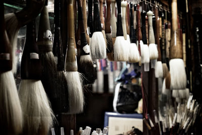 Close-up of clothes hanging for sale