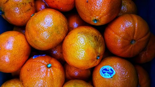 Full frame shot of oranges at market