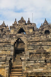 Exterior of historic building against sky