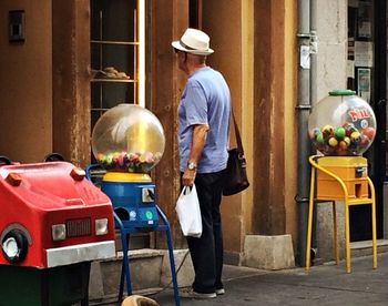 Full length of woman standing in the dark