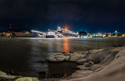 Two harbors at night