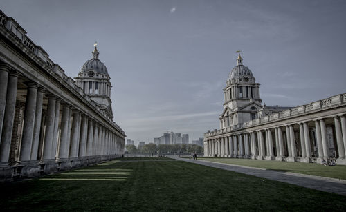 Historic buildings against sky in city