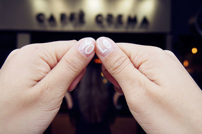 Close-up of couple holding hands