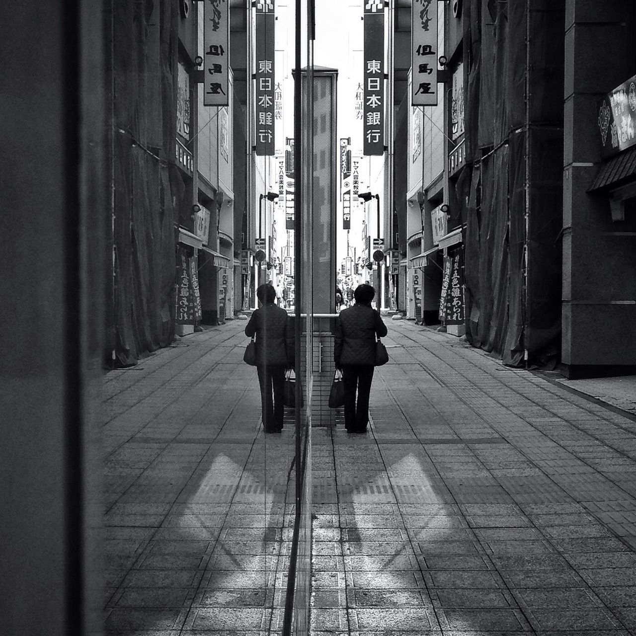 building exterior, architecture, built structure, city, rear view, men, full length, walking, lifestyles, city life, the way forward, street, person, leisure activity, building, day, outdoors