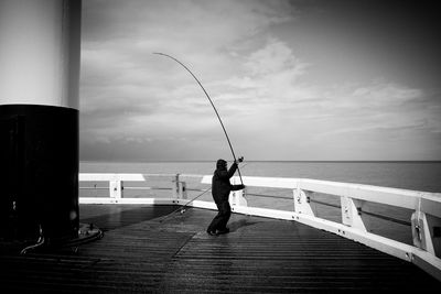 Man fishing in sea