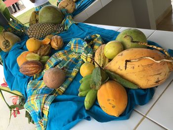 High angle view of fruits in basket on table