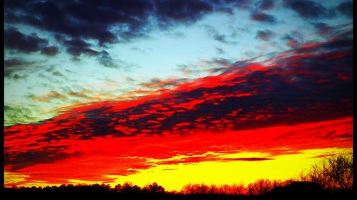 Scenic view of dramatic sky during sunset