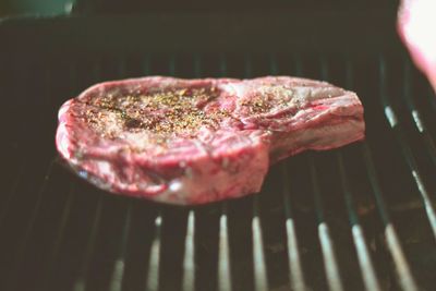 Close-up of beef steak on barbeque