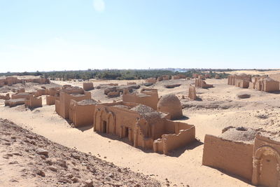 Panoramic view of beach against clear sky
