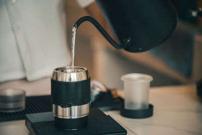 Close-up of coffee cup on table